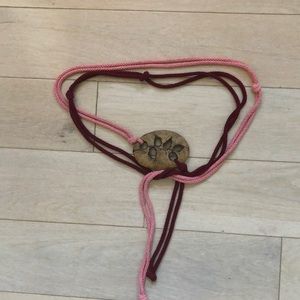 Vintage pink corded belt with ceramic design front